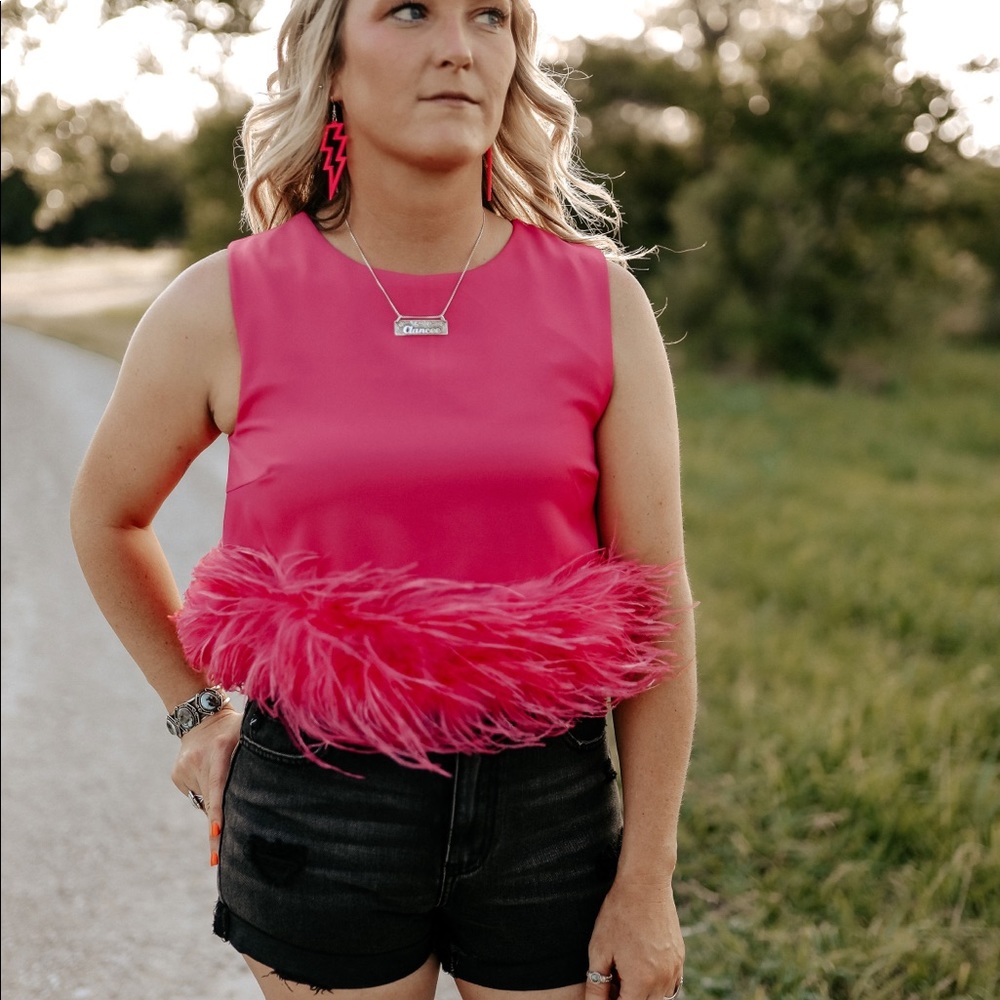 Pink feathered top